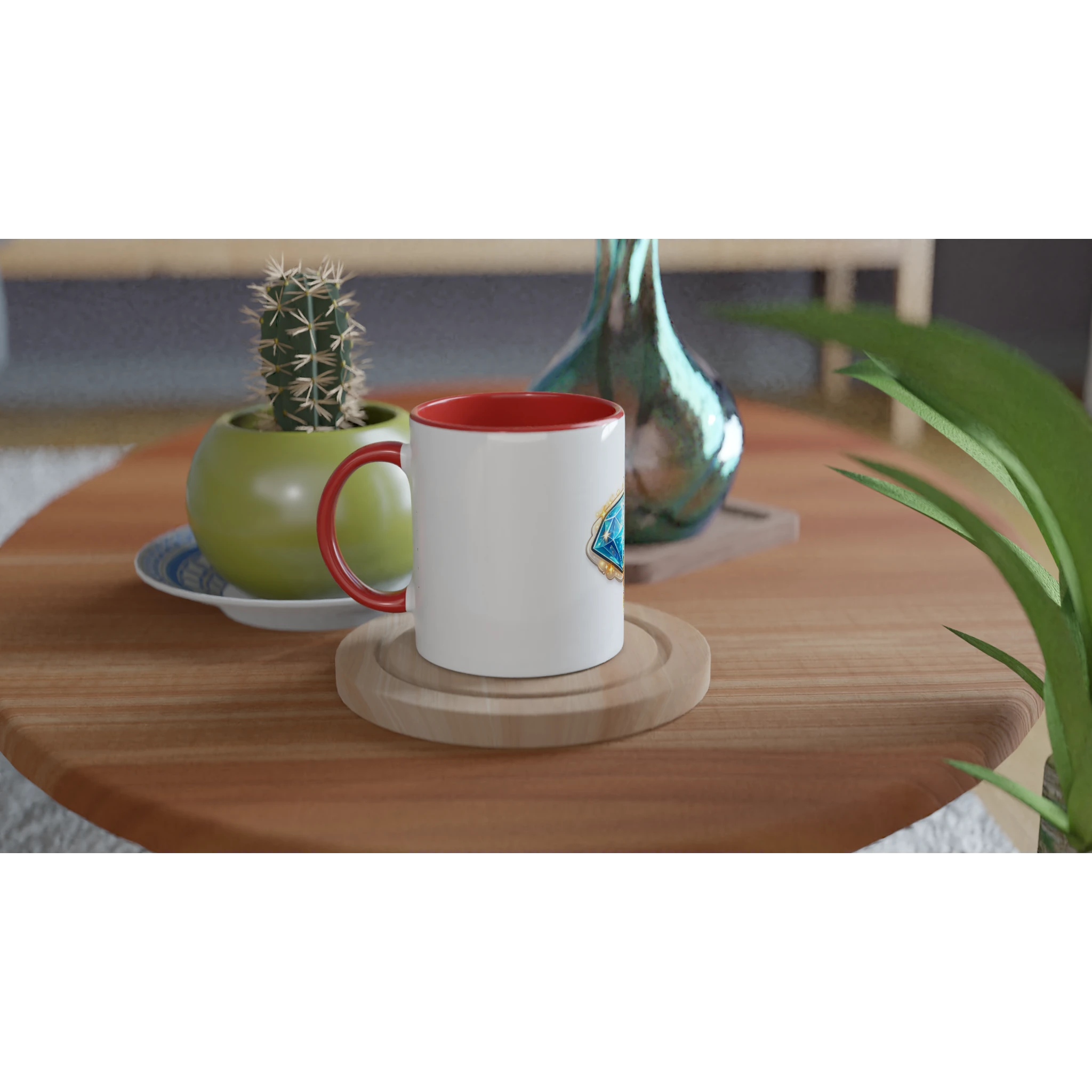 White mug with red interior on a wooden table with a cactus and decorative vase.