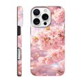 Phone case with cherry blossom design on a white background