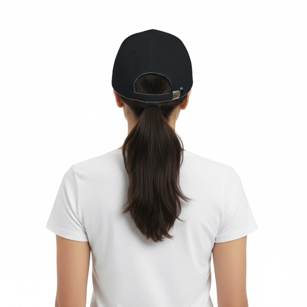 Person wearing a black cap and white shirt on a white background