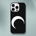 Black phone case with a white crescent moon design on a light gray background